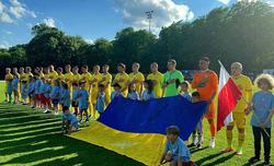 Footballers and volunteers unite in Warsaw