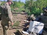 Армия бомжей и мародёров: на позициях ВС РФ обнаружена украденная стиральная машина (ФОТО)