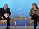 Путин предложил России и Германии обменяться сборными
