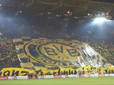 Дортмундская «Боруссия» запретила фанату три года посещать стадион за оскорбительный баннер