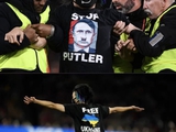 During the final of the Women's World Cup, a spectator wearing a football with inscriptions "Stop Putler" and "Free Ukraine" ran